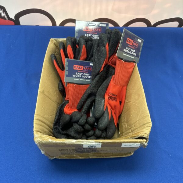 Box of new medium work gloves for hand protection.