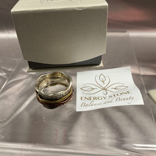 Silver energy stone ring size T with copper and brass bands.