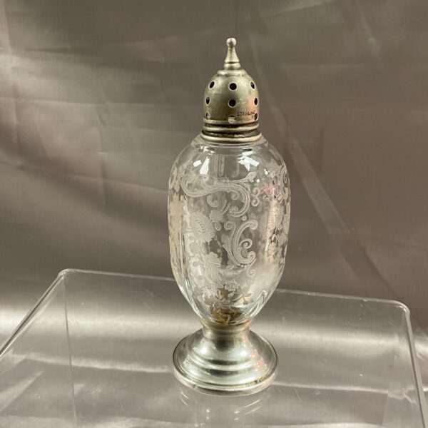 Antique sterling silver talc shaker with etched glass.
