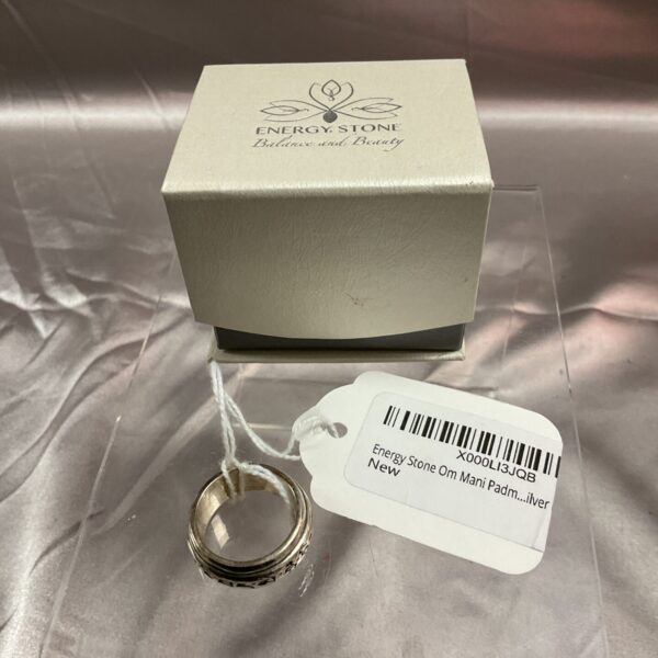 Silver rotating energy stone ring size Q.