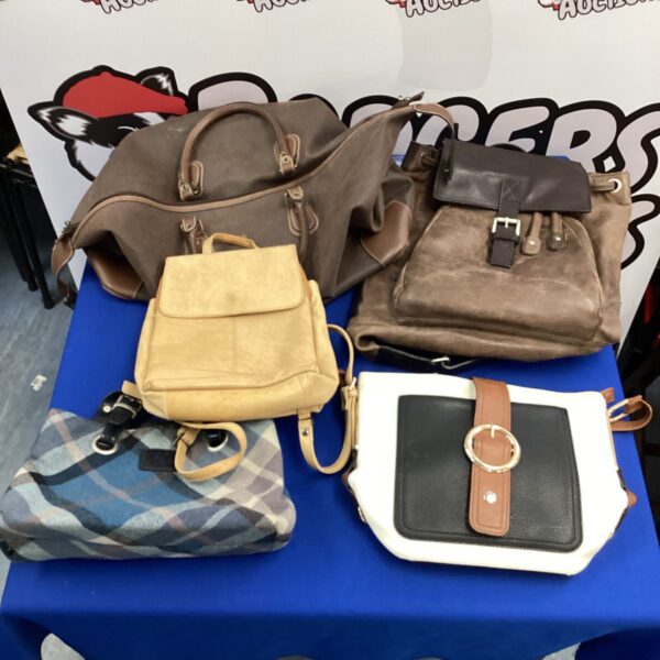 Mixed lot of leather handbags in various styles and colours.