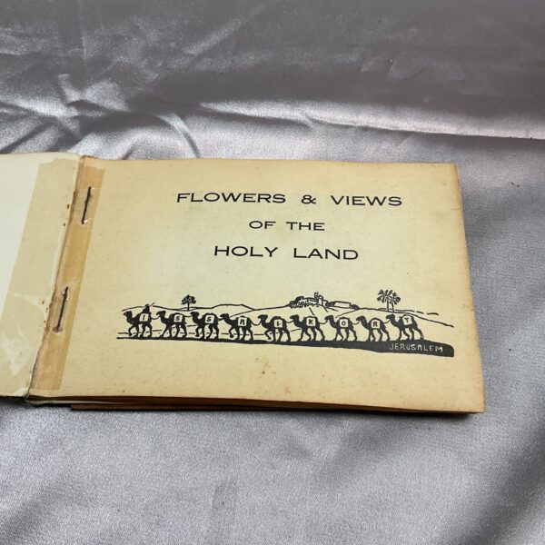 Vintage Holy Land booklet cover with floral illustration.