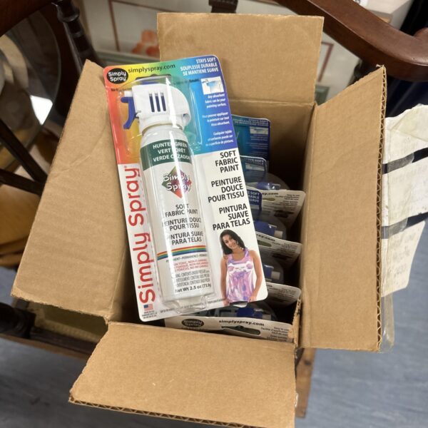 Box of Simply Spray hunter green fabric paint for DIY projects.