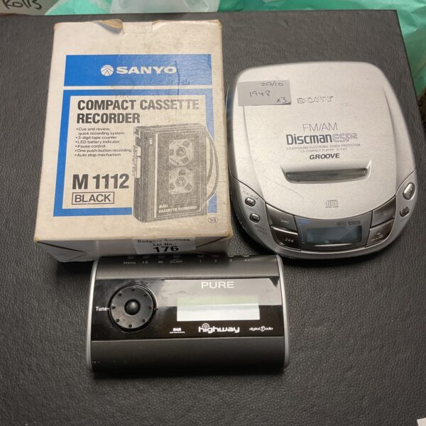 Vintage radio cassette player lot including Sanyo and Sony devices.