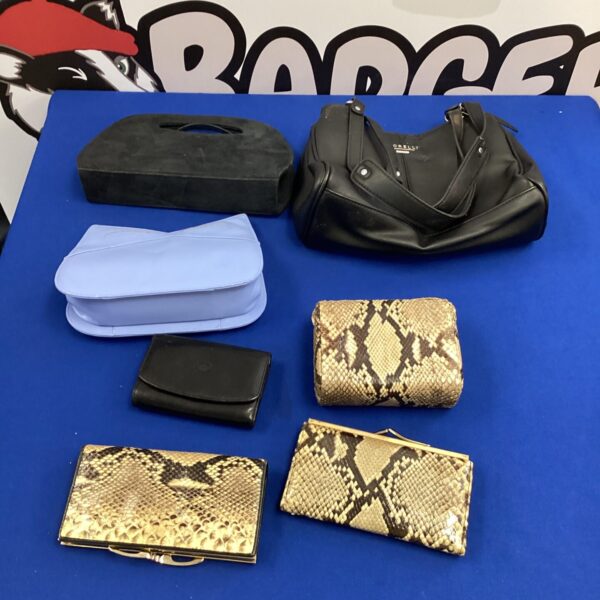 Collection of vintage ladies handbags and clutches.