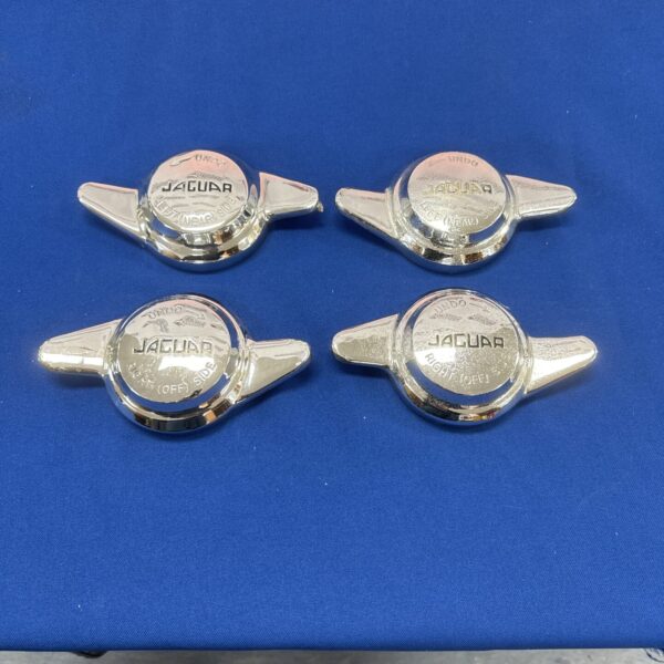 Set of four vintage Jaguar wheel knock off hub spinners.