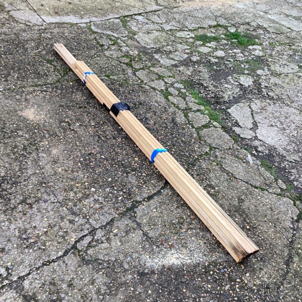 Lengths of wooden skirting boards for home renovation projects.