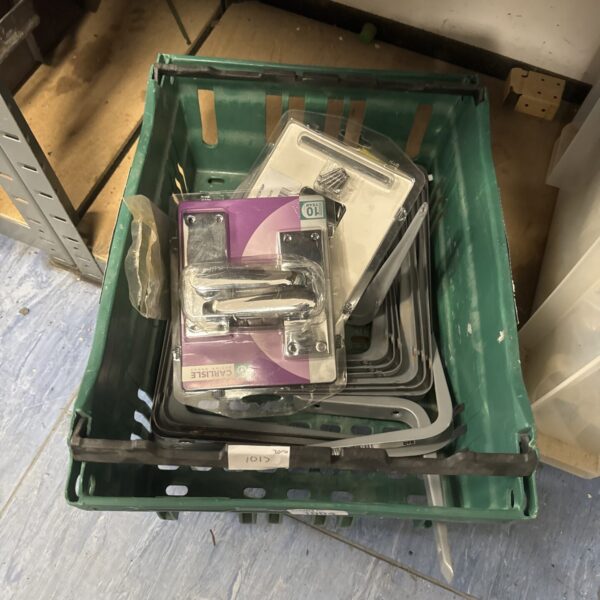 Mixed lot of metal shelf brackets and door handles for home use.