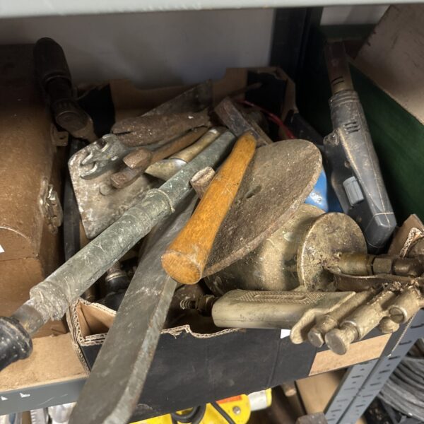 Assorted vintage garden tools in a metal tray.