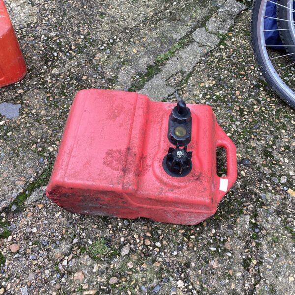 Red Moller plastic fuel tank for boats and outboard motors.