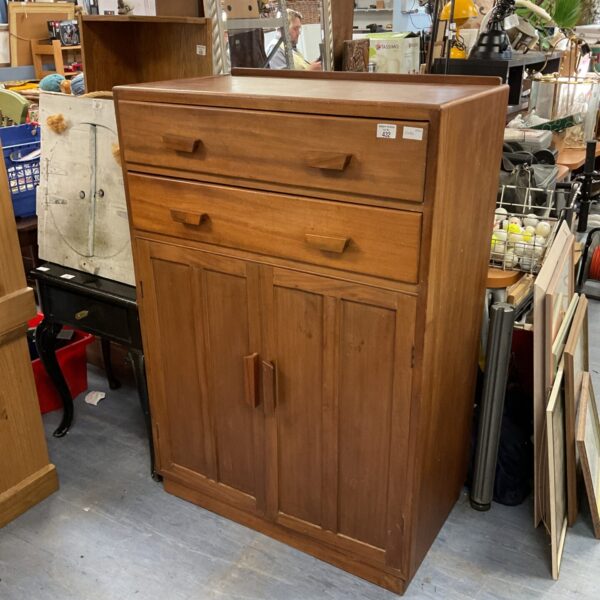 Vintage mahogany bedroom cabinet with two drawers, mid-century style.