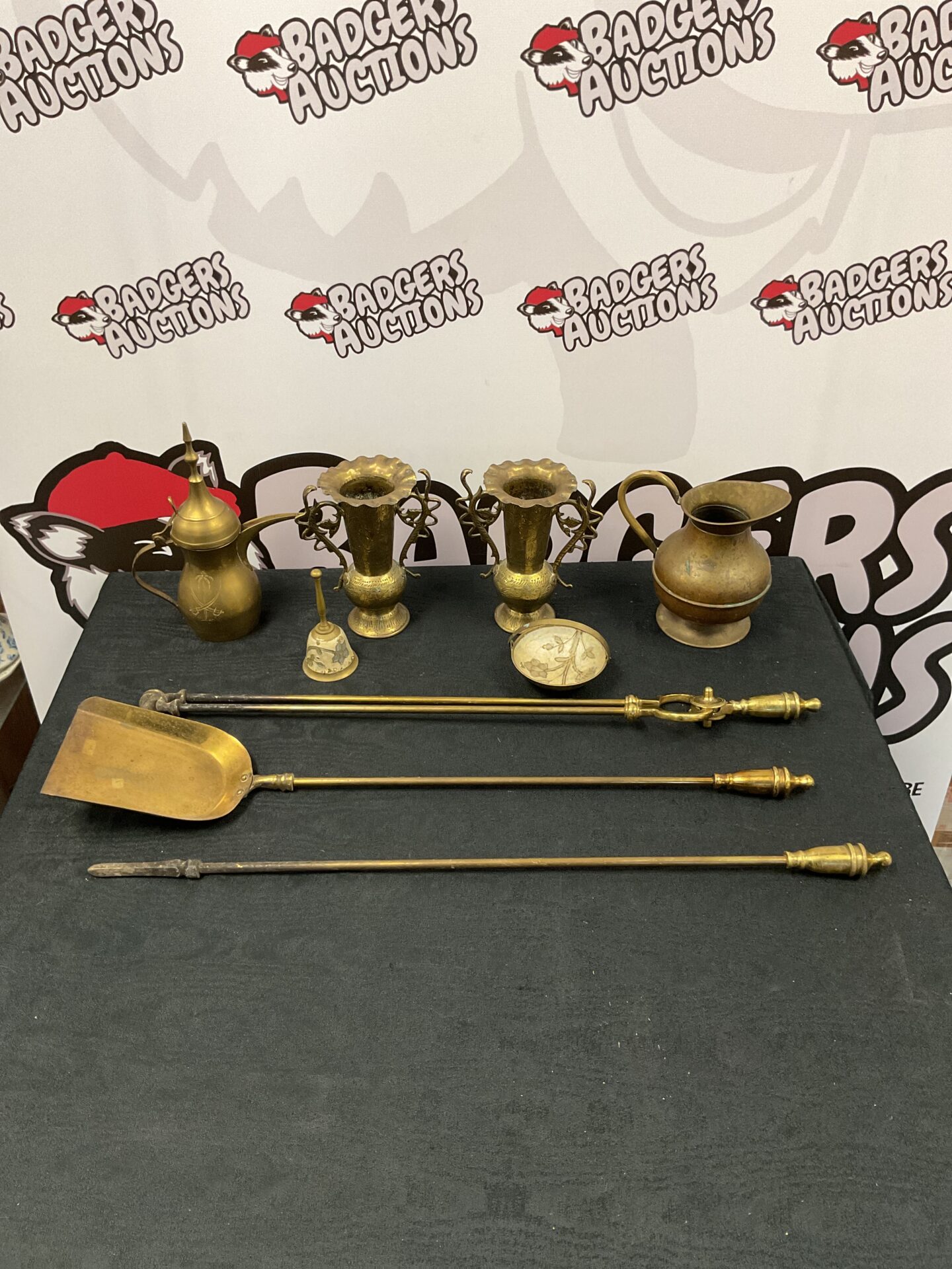 081 Box of brassware including companion set tools & cobra snake urn vases