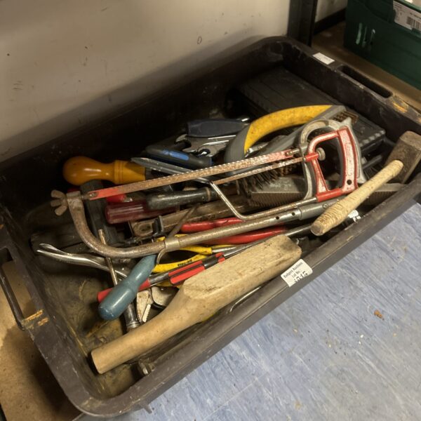 Assorted rusty hand tools in a shed clearance lot.