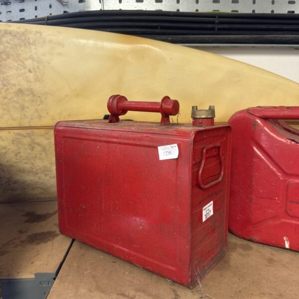 Vintage red Valor fuel can, small metal container.