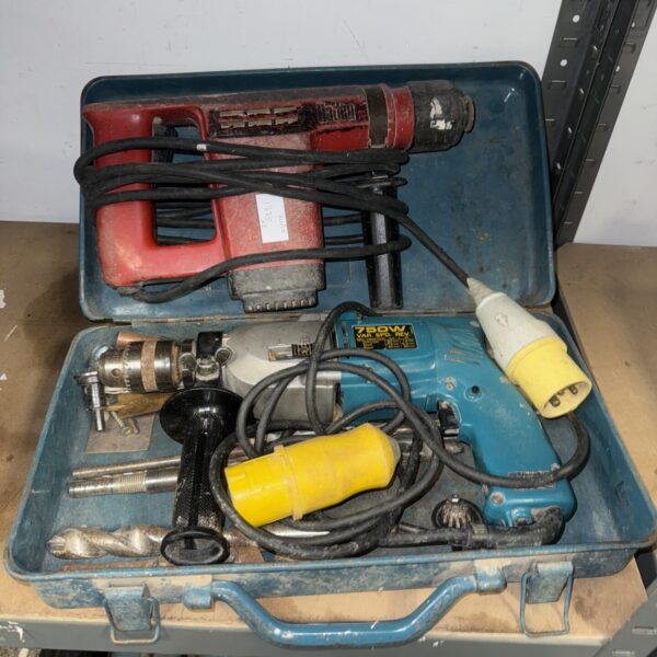 Vintage hammer drill pair with case, ideal for collectors.