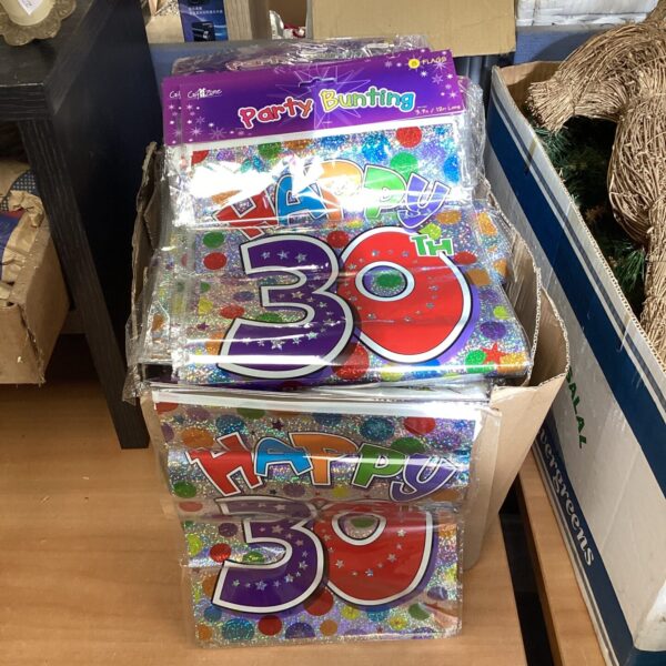 Colourful birthday bunting for 30th and 40th celebrations, party decorations.