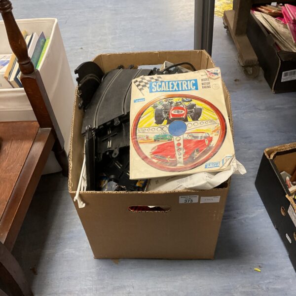Vintage Scalextric motor racing set box with colourful graphics.