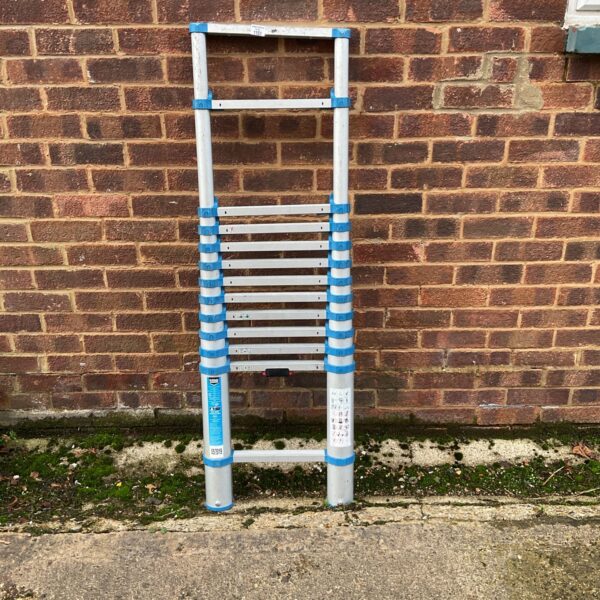 Aluminium telescopic ladder extended, ideal for DIY and home use.