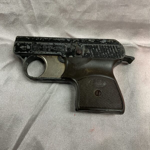 Vintage Model 1949 6mm blank firing pistol for collectors.