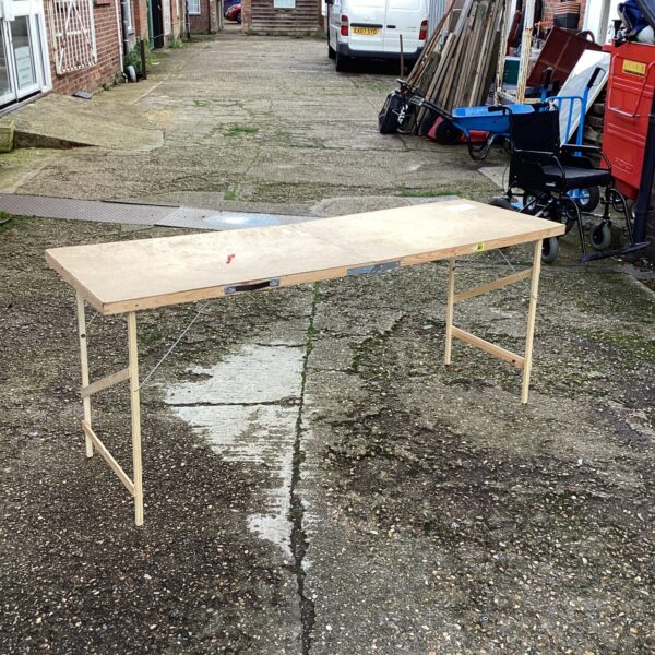 Vintage folding paste table for DIY and craft projects.