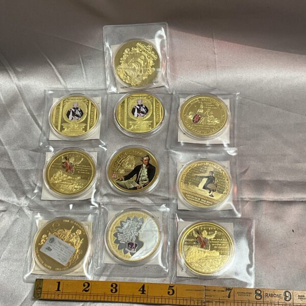 Lot of ten large commemorative coins featuring royal and famous characters.