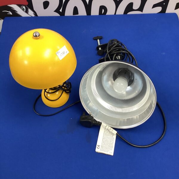 Vintage industrial lamp with enamel shade and adjustable arm.