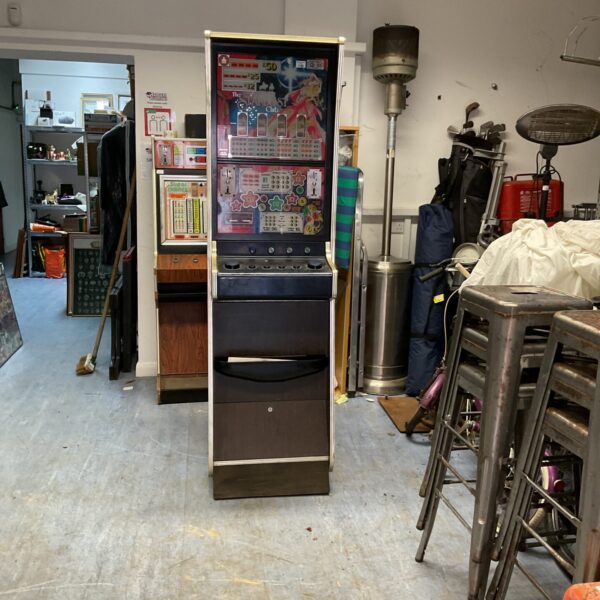 Front view of a vintage Stardust Club fruit machine.