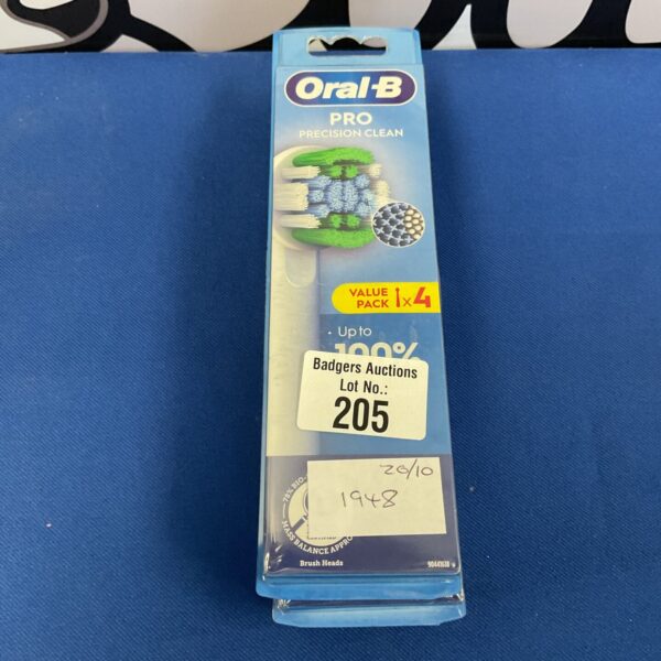 Four packets of oral b precision clean electric toothbrush heads