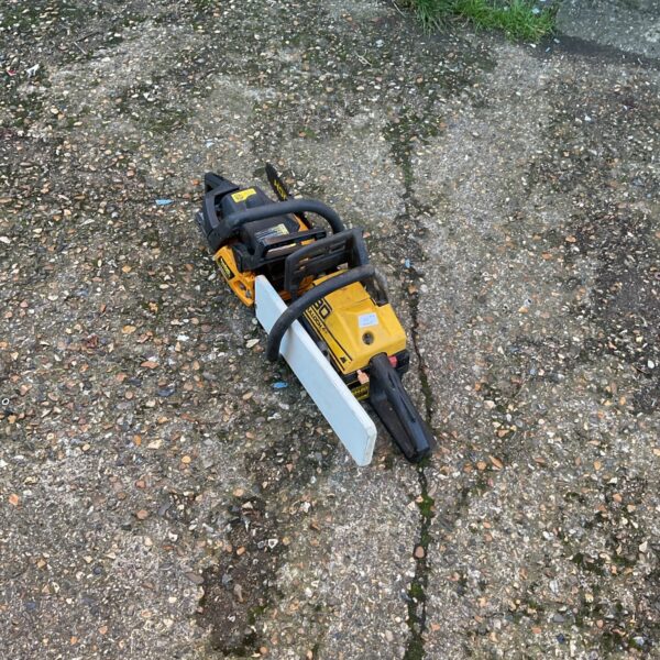 Vintage petrol chainsaw, McCulloch or Poulan, for garden and DIY use.