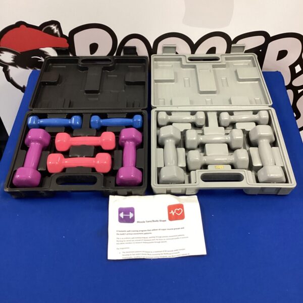 Pink and grey fitness dumbbells for home exercise.
