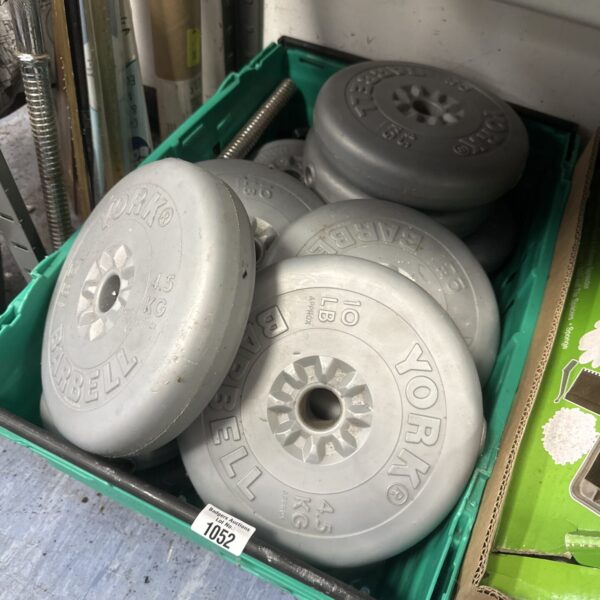 York vinyl weight set with barbell and dumbbell plates for home gym.