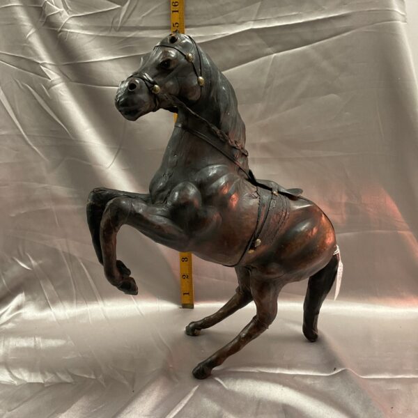 Vintage leather horse sculpture in the style of Liberty & Co.