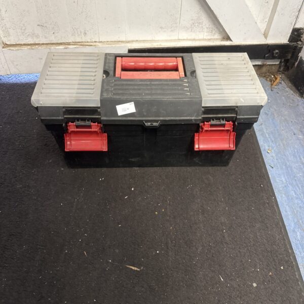 Empty plastic toolbox with a red handle, ideal for tool storage.