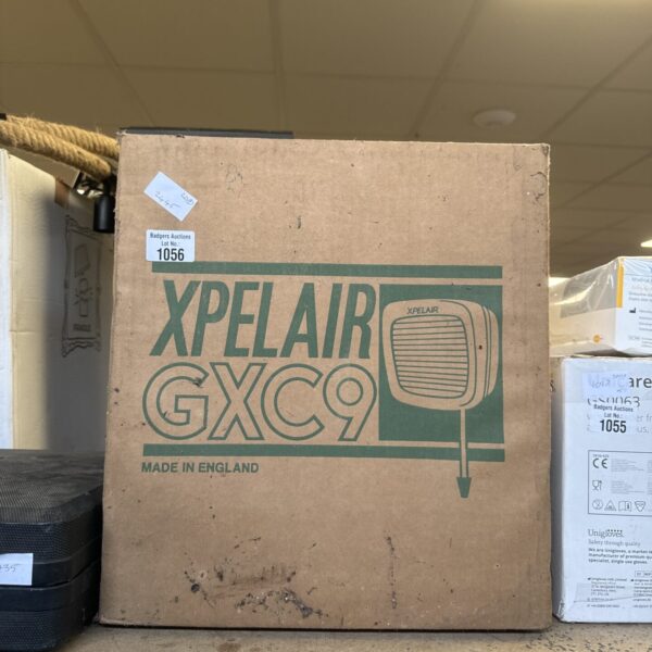 Sealed Xpelair GX9 extraction fan box, vintage bathroom ventilation.