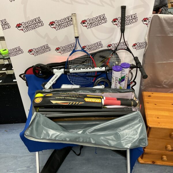 Sports equipment bundle including scooter, badminton, tennis and cricket.