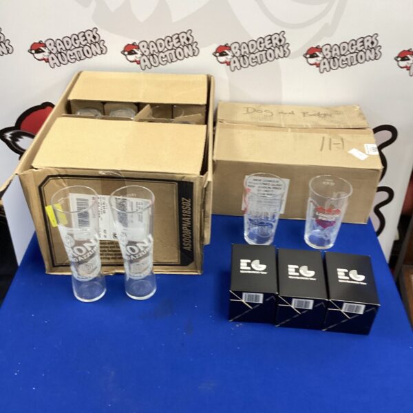 Selection of Peroni and London Pride branded pub glasses.