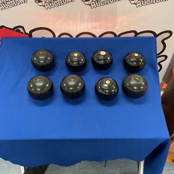 Set of eight Vitalite lawn bowls for outdoor garden games.