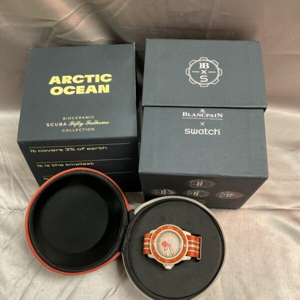 Blancpain Swatch Scuba Fifty Fathoms Arctic Ocean watch with packaging.