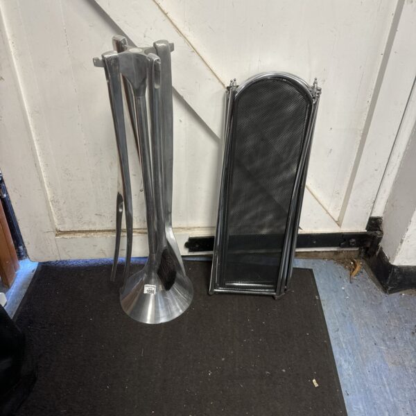 Vintage chrome fireplace companion set with firescreen and tools.