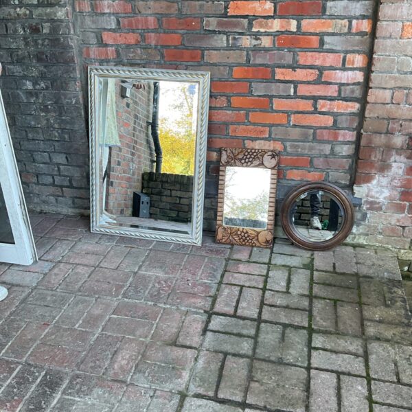 Lot of three vintage bevelled edge mirrors for antique home decor.