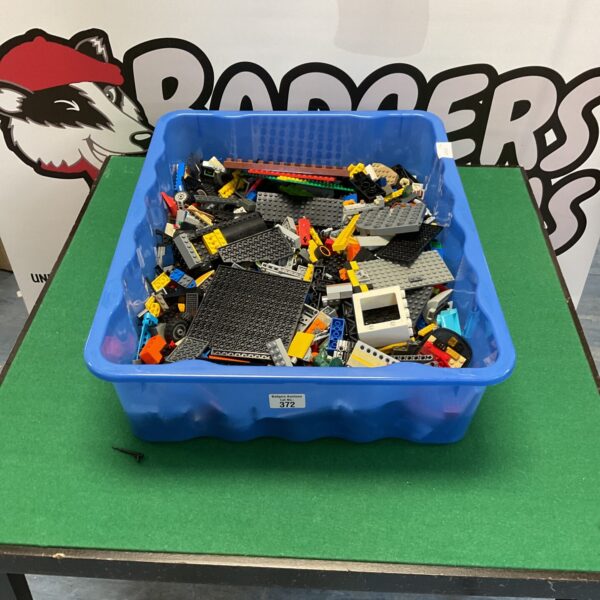 Assorted colourful Lego bricks in a mixed lot for building.