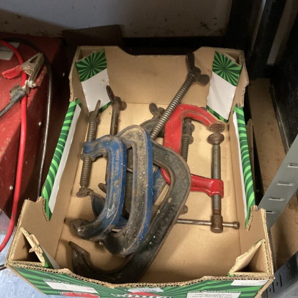 Tray of vintage Record G clamps for woodworking projects.