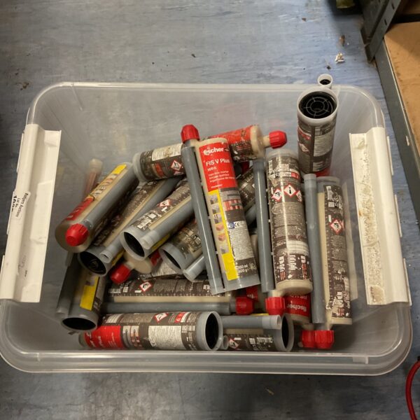 Boxes of fischer injection mortar for concrete fixings and construction projects.