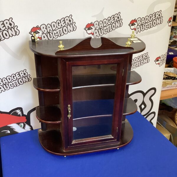 Small Victorian mahogany display cabinet for collectibles.