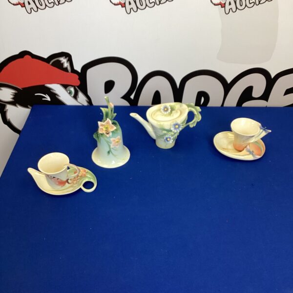 Vintage Franz bone china tea set with floral design.