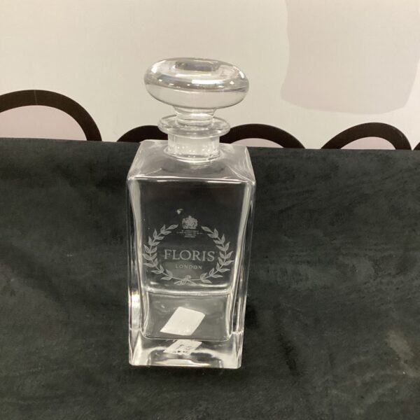 Vintage Floris of London whiskey decanter, clear glass design.