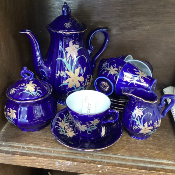 Vintage Japanese coffee set with blue and gold detailing.