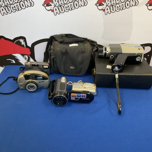 Vintage camera lot including Samsung, Chinon, Vivitar, Kodak, and Olympus cameras.