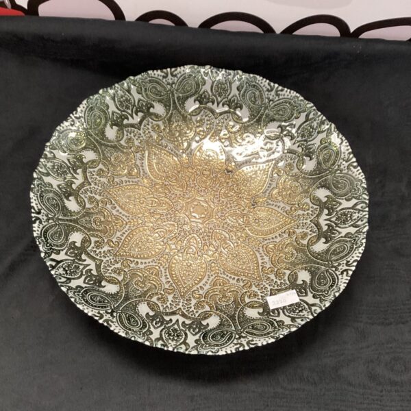 Intricate Moroccan silverglass plate with detailed silver overlay.