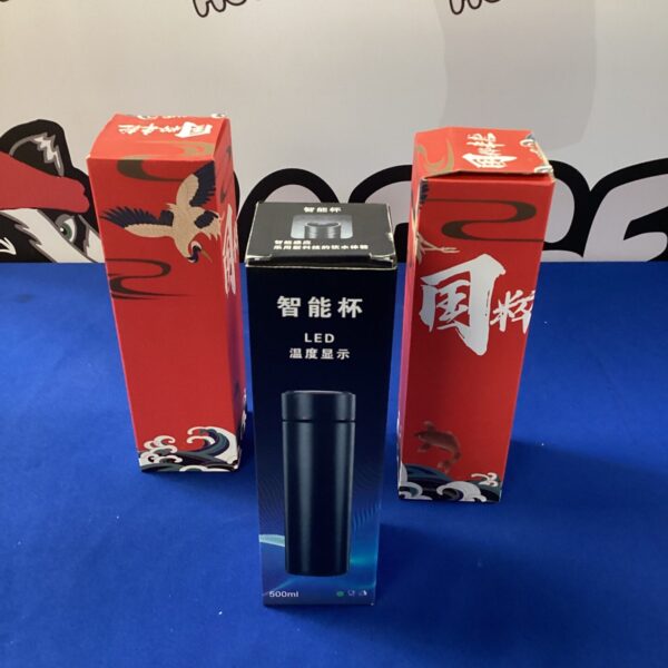 Stainless steel temperature display flask with digital screen.